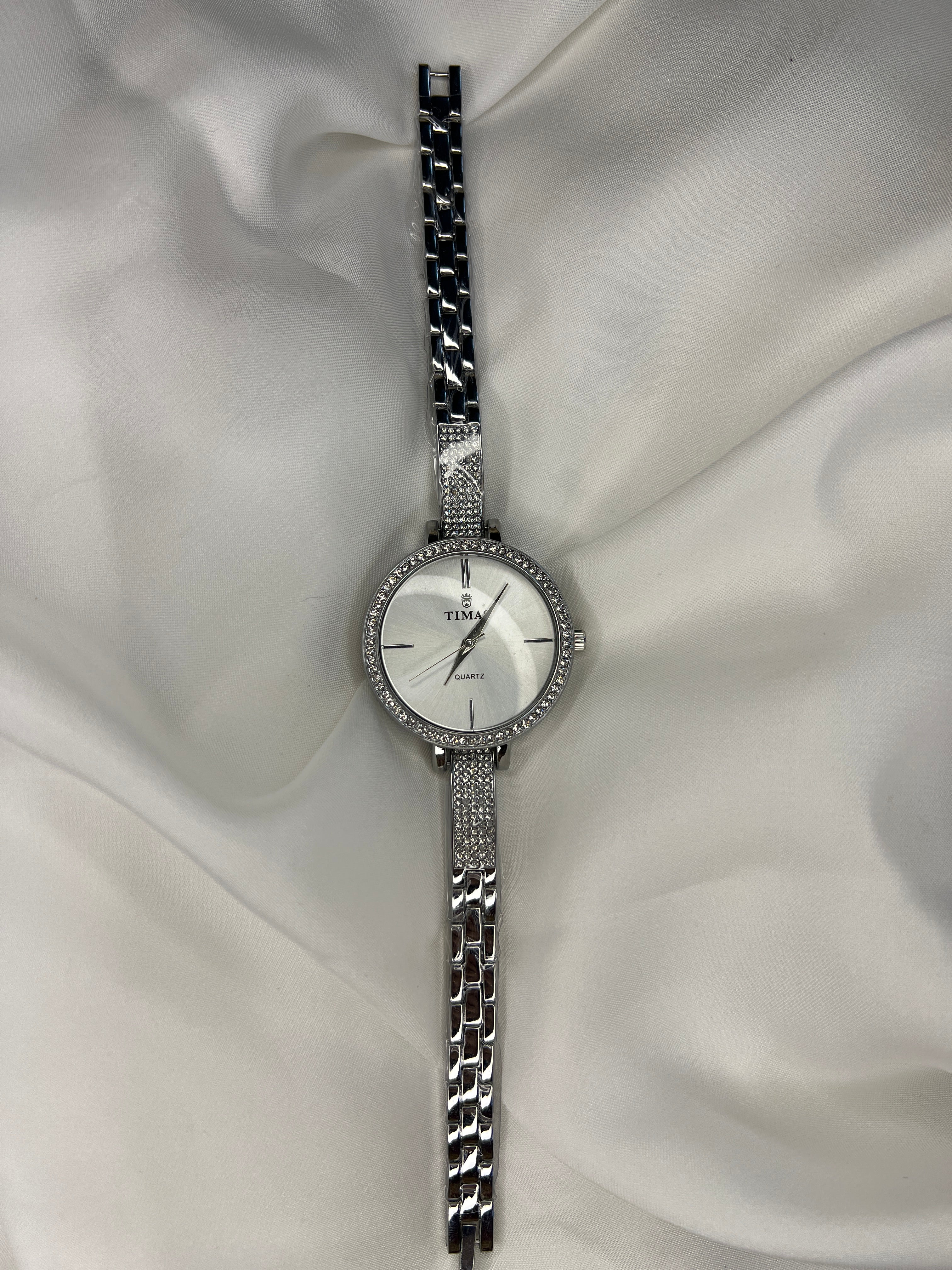 TIMAS ROUND WATCHES