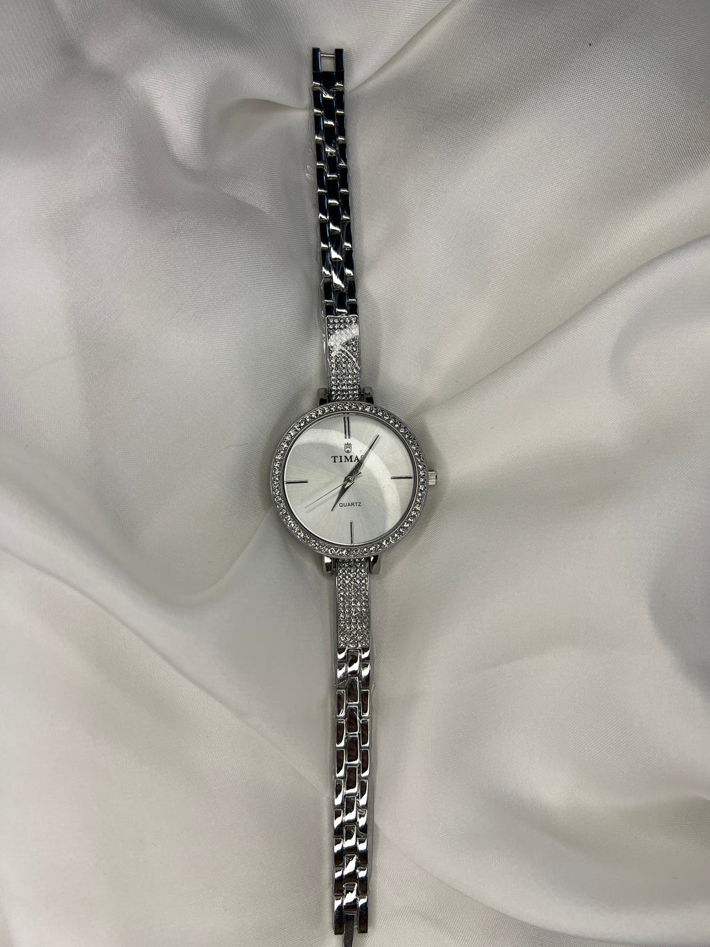 TIMAS ROUND WATCHES